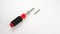 Screwdriver with interchangeable nozzles.On white background