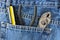 Screwdriver and Pliers in Blue Jeans Pocket