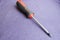 Screwdriver with rubberized red-black handle