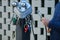 screwdrivers, wrenches, tire pump, man uses quick repair tool terminal to repair bicycles in urban landscape bike parking lot,