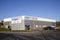 Screwfix shop front with car park and blue sky background