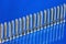 Screws for repair and manufacture of equipment on a blue background, for the inscription. The screw is a powerful popular fastener