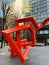 Scribbleform is a red sculpture by Julian Wild on the streets of Canary Wharf London