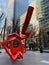 Scribbleform is a red sculpture by Julian Wild on the streets of Canary Wharf London