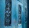 Scrollwork on Teal Blue Doors