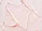 Scrub smears. Pink exfoliating body polish texture
