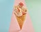 Scrumptious strawberry ice cream cone isolated on pink background