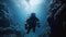 Scuba deep sea diver swimming in a deep ocean