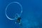 Scuba diver blows bubble rings