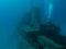 A Scuba Diver Explores a Wreck