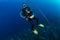 SCUBA diver next to a descent line