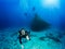 Scuba diver shows the OK sign in the blue, Aegean Sea in Greece