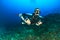 SCUBA Diver using sidemount tanks