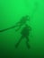 scuba divers green water diving