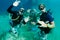 Scuba divers learn dive coarse and are happy