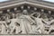 The sculpted tympanum of the `La Madeleine`church, Paris