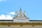 Sculptural composition of the coat of arms of noblemen Urusky on the building of the palace. Warsaw, Poland