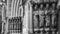 Sculptural images of the apostles on the facade of the Anglican Cathedral in Cork, Ireland. Monochrome. Saint Fin Barre\\\'s