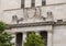 Sculpture above entrance to the historic Federal Reserve Bank of Dallas building at 400 Akard Street in Dallas, Texas.