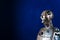 Sculpture of the android robot on a dark blue background