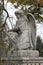 Sculpture of an angel in the cemetery, a graveyard figurine, a large angel with wings