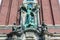 Sculpture of Angel killing a devil in front of Church of St. Michael, Hamburg, Germany. A landmark of the city and it is
