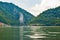 Sculpture bas-relief of the Dacian king Decebal, located on the rocky bank of the Danube in Romania. View from the coast of Serbia