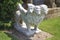 Sculpture of a beast or a lion with four heads and wings at the Italian garden of Hever castle in England