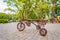Sculpture `The bicycle of my childhood` in Gagarin`s park on a summer day. Text in Russian: the city was established by the new