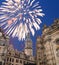 Sculpture on the Bruhl Terrace and Hofkirche or Cathedral of Holy Trinity and holiday fireworks - baroque church in Dresden, Sach