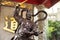 Sculpture chinese deity god guardian at entrance of Wong Tai Sin Temple at Kowloon in Hong Kong, China