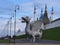 Sculpture dragon at the entrance to the subway on the background of the Kazan Kremlin