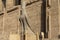 Sculpture of a falcon in a crown at the entrance to the Temple of Horus in Edfu.