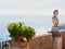 Sculpture and flowers at terrace in Ravello village