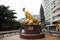 Sculpture golden dragon guardian at roundabout at Morrison Hill road in Hong Kong, China