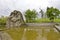 Sculpture of a Grieving Mother and a swimming pool