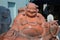 Sculpture happy fat Buddha (Buddha Jila) close-up. Danang, Vietnam