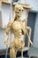 Sculpture of the human skeleton with muscles on a blurred background. Vertical frame