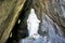 Sculpture Jesus Christ in a stone grotto .