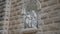 Sculpture of Joseph, Mary and Jesus statues in a niche wall at St. Joseph`s Church, in the old city of Nazareth in Israel