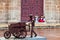 Sculpture of a man with a traditional wheelbarrow at the San Pedro Claver square in Cartagena de Indias