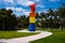 Sculpture in the Miami Beach Park. Art. Multi-colored tower in the park. Beautiful vacation in May. Design and
