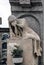 Sculpture of mourning crying woman on a grave