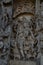 Sculpture on the outer walls of Hoysaleswara Temple at Halebidu , Karnataka, India