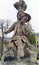 Sculpture of a putto playing with a gopher, in the Court Gardens of the Residenz, Wurzburg, Germany