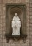 Sculpture of Saint John Bosco on the main square of Santa Maria de Montserrat.