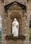 Sculpture of Saint Teresa of Avila on the main square of Santa Maria de Montserrat.