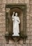 Sculpture of Saint Vincent De Paul on the main square of Santa Maria de Montserrat.