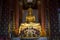 Sculpture of a seated Buddha in Wat Naphrameru. Ayuthaya, Thailand