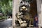 Sculpture stone Qilin dragon guardian at entrance of Wong Tai Sin Temple at Kowloon in Hong Kong, China